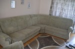 Gut erhaltene Ecksofa, mit Bettfunktion und Sessel